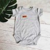 body de bebe gris por cantidad